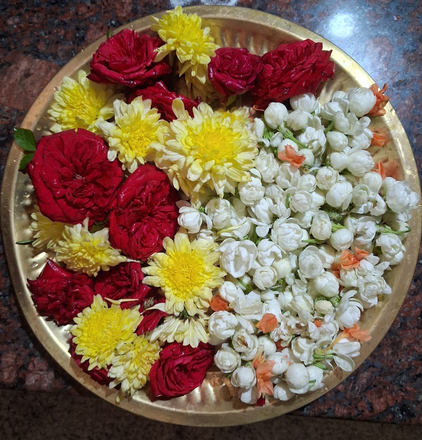 Fresh jasmine and mango leaf decorations